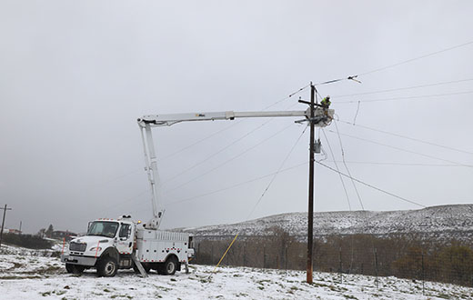 Crews restore power after a heavy, wet spring snowstorm.